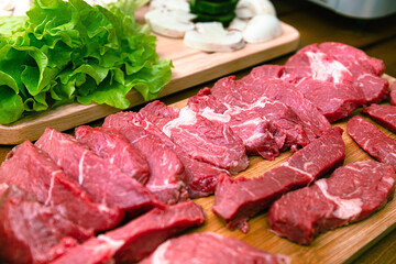 Yakiniku is the food that grille a thin sliced beef and dipped in a soy-bean sauce based sauce