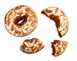 Chopped gingerbread cookies with sugar icing isolated on white background with clipping path top view