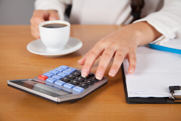 Business woman works in her office.