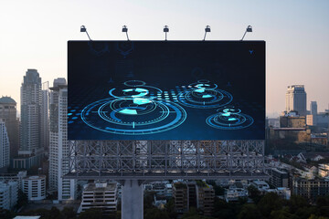 Glowing hologram of technological process on billboard, aerial panoramic cityscape of Bangkok at...