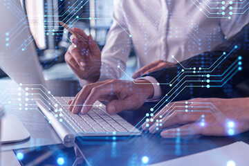 Two information technology specialist brainstorming on project to create a new approach to develop...