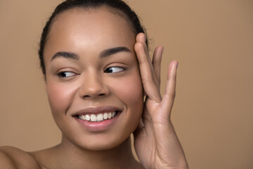 Attractive woman looking away with coquettish smile