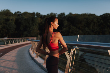 Girl doing sport outdoors in the morning