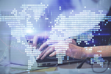 Multi exposure of woman hands typing on computer and business theme hologram drawing. Success concept.