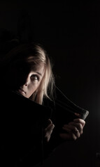 Portrait of a woman in the dark