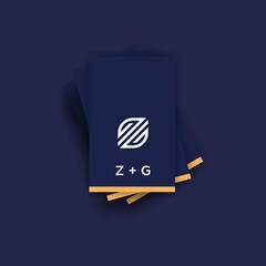 logo z g monogram with a card in a cool dark blue and yellow color