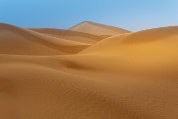Fototapeta na wymiar Sand dunes in Sahara desert, Tagounite, Morocco