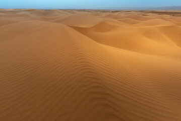 Fototapeta na wymiar Sand dunes in Sahara desert, Tagounite, Morocco