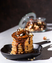 pancakes with banana, chocolate and hazelnuts