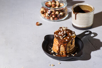 pancakes with banana, chocolate and hazelnuts