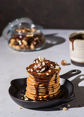 pancakes with banana, chocolate and hazelnuts