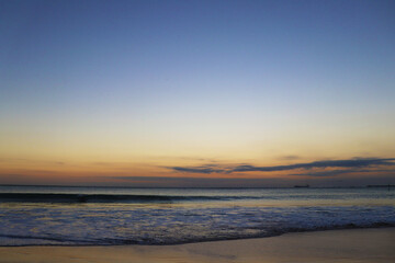 sunset on Jimbaran beach Bali Indonesia