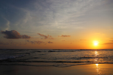 Naklejka na ściany i meble a perfect sunset scene at Canggu beach Bali, Indonesia