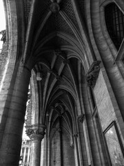 Black and white capture of vaulted archway ceilings off the Grand Place in Brussels