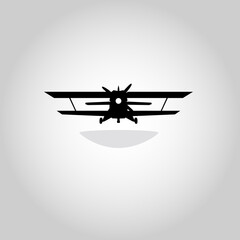 Biplane. Retro airplane illustration. Vintage plane front view. Isolated vector illustration. Plane icon. © Artem