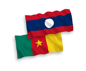 National vector fabric wave flags of Cameroon and Laos isolated on white background. 1 to 2 proportion.