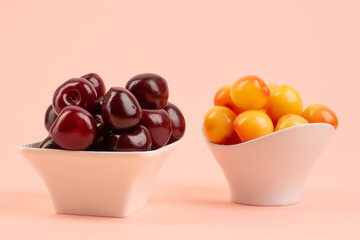 Red and yellow cherry in studio