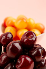 Red and yellow cherry in studio