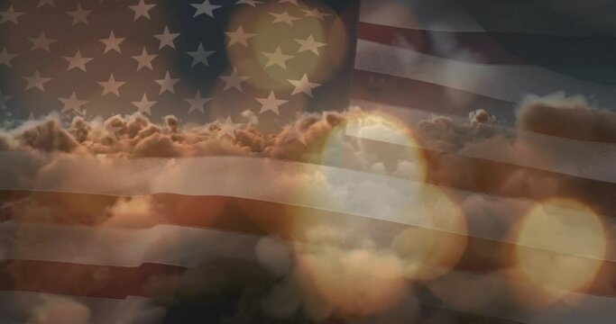 Animation of glowing spots and sun shining on sky with clouds over american flag