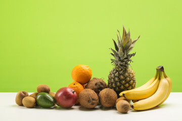 Many various fruits and berries in studio