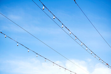 The bulbs are hung in long rows background sky , look beautiful in the morning