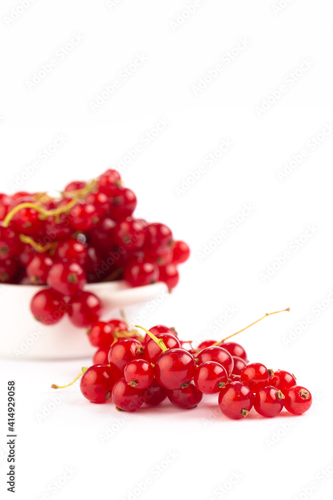 Wall mural Red currant on white background 