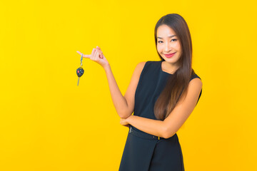 Portrait beautiful young asian business woman with car key
