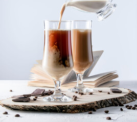 Two glasses of iced coffee and milk