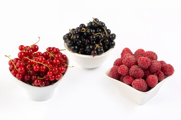 Fresh raspberry and currant close up in studio