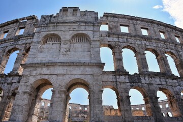 Naklejka premium The Roman Amphitheater of Pula, Croatia. UNESCO world heritage. Tourist attraction of Pula.