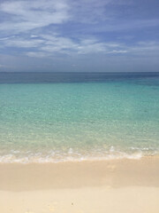 Fototapeta na wymiar A perfect beach, crystal clear water, white sand beach at Kodingareng Island South Sulawesi Indonesia