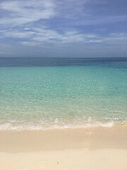 Fototapeta premium A perfect beach, crystal clear water, white sand beach at Kodingareng Island South Sulawesi Indonesia