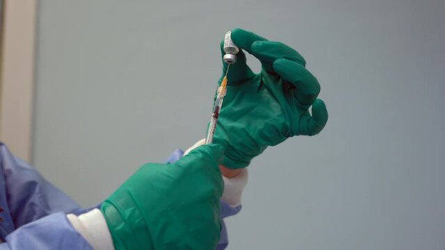 Europe, Italy, Milan 02-18-2021 - Start of Covid-19 Coronavirus vaccination at the military hospital in Via Saint Bon - Army and military administer dose 