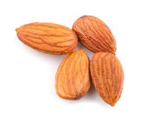 Closeup of almonds, isolated on the white background.