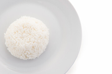 Close up cooked rice on plate isolated on white background.