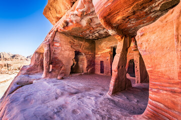 Petra, Jordan - Ancient stone carved houses in Wasi Musa - obrazy, fototapety, plakaty