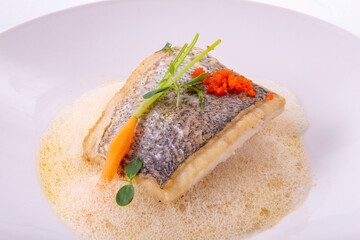 Sea bass in vegetable sauce