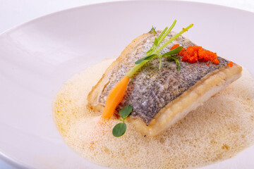 Sea bass in vegetable sauce