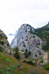 Obraz premium Mountainous terrain against the background of the sky and the sea.