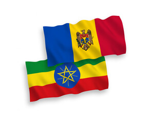 National vector fabric wave flags of Moldova and Ethiopia isolated on white background. 1 to 2 proportion.