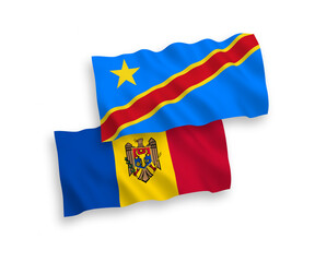 National vector fabric wave flags of Moldova and Democratic Republic of the Congo isolated on white background. 1 to 2 proportion.