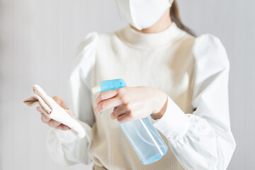 Woman preparing for alcohol disinfection