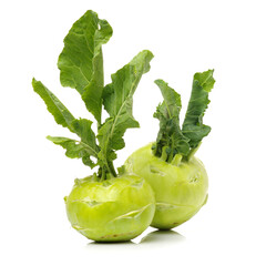 Fresh kohlrabi with green leaves on isolated white backround