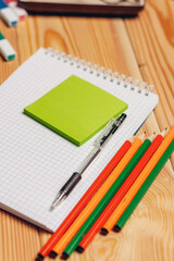 notepads pencils office work paper wood background