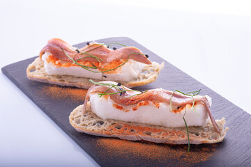 Cantabrian anchovies on crusty bread toast
