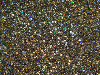 Abstract background with shiny silver-gold metallic glitter decor.