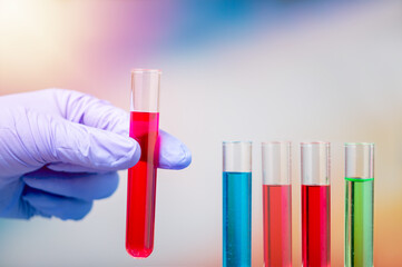 Cropped shot of scientist hand holding laboratory test tube