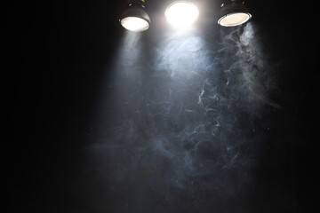 studio lights filled with smoke and dust particles