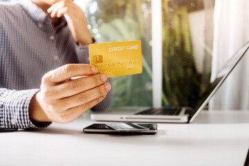 Digital marketing media in virtual screen.businesswoman hand working with mobile phone and modern compute with VR icon diagram at office in morning light