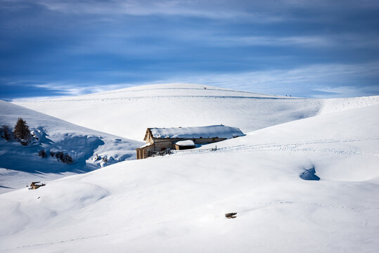 Old stone farmhouse on Lessinia Plateau in winter with snow. (Altopiano della Lessinia), Regional Natural Park, near Malga San Giorgio and Malga Gaibana, Verona Province, Veneto, Italy, Europe.